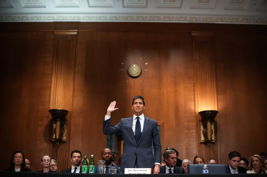 Kevin Warsh is sworn in to testify during his Senate Committee